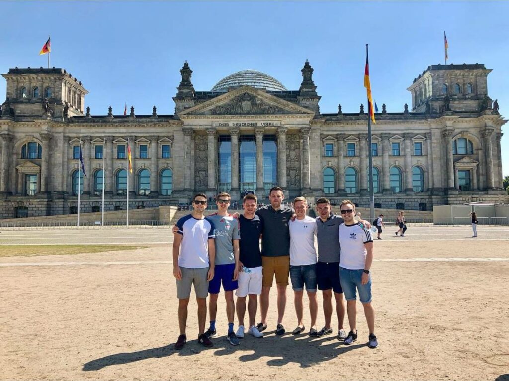 me with some friends standing in front of the Reichstag